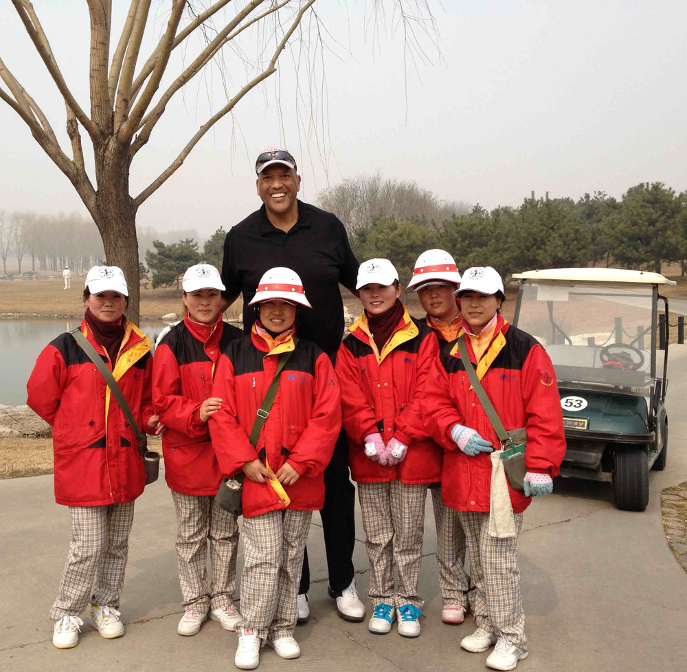 James_and_golf_caddies_in_beijing_-_march_2013